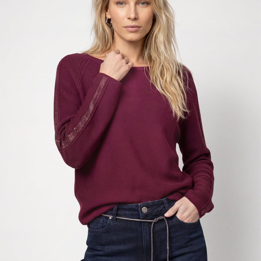 Pull avec détails scintillants