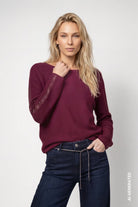 Pull avec détails scintillants